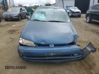 1999 Chevrolet Prizm z VIN 1Y1SK5281XZ414148, wystawiony jako Copart lot #71731384 z przebiegiem 224 527 mil mil oraz Szkoda całkowita • Salvage title. Historia ofert i sprzedaży dostępna na DreamBid. Obrazek 5.