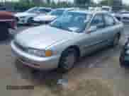 1996 Honda Accord LX with VIN 1HGCD5630TA172402, listed as a IAAI auction lot 42758297 with 209,914 mi miles and . Bid and sale history available at DreamBid. Image 2.