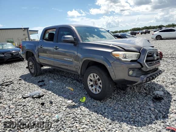 2017 Toyota Tacoma SR5 с VIN 5TFAZ5CN3HX036928, выставлен на аукционе Copart как лот 80676135 с пробегом 165 293 миль миль и Списание • Salvage title. История ставок и продаж доступна на DreamBid. Изображение 4.