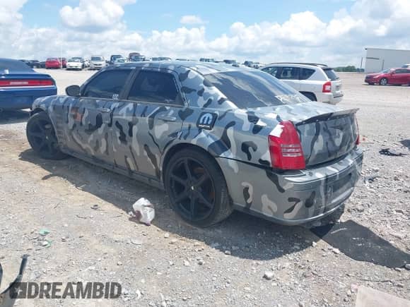 2006 Chrysler 300 C SRT-8 with VIN 2C3LA73W46H216929, listed as a IAAI auction lot 42660806 with 202,363 mi miles and . Bid and sale history available at DreamBid. Image 3.