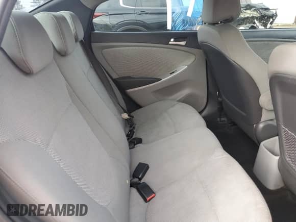 2014 Hyundai Accent GLS z VIN KMHCT4AE5EU703823, wystawiony jako Copart lot #86420595 z przebiegiem 132 910 mil mil oraz Szkoda całkowita • Salvage title. Historia ofert i sprzedaży dostępna na DreamBid. Obrazek 10.