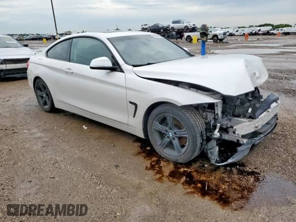 2015 BMW 4 Series 428i z VIN WBA3N7C59FK222559, wystawiony jako Copart lot #60604025 z przebiegiem 151 375 mil mil oraz Szkoda całkowita • Salvage title. Historia ofert i sprzedaży dostępna na DreamBid. Obrazek 4.