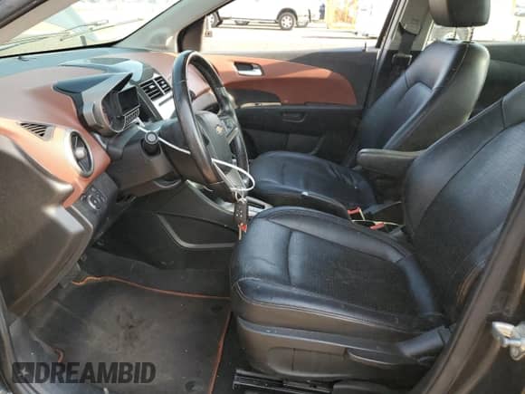 2015 Chevrolet Sonic LTZ with VIN 1G1JE5SB1F4103066, listed as a Copart auction lot 68816515 with 58,819 mi miles and Salvage title. Bid and sale history available at DreamBid. Image 7.