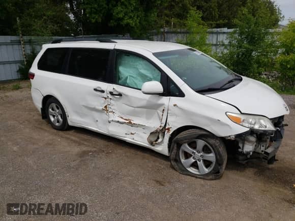 2016 Toyota Sienna L with VIN 5TDZK3DC9GS748311, listed as a Copart auction lot 58124985 with 196,426 mi miles and Clean title. Bid and sale history available at DreamBid. Image 4.