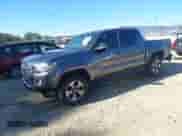 2016 Toyota Tacoma SR5 z VIN 5TFAZ5CN1GX009418, wystawiony jako IAAI lot #43365469 z przebiegiem 180 719 mil mil oraz . Historia ofert i sprzedaży dostępna na DreamBid. Obrazek 18.