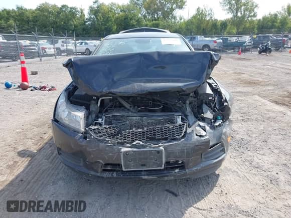 2013 Chevrolet Cruze LS z VIN 1G1PA5SH0D7114405, wystawiony jako IAAI lot #43191168 z przebiegiem 115 150 mil mil oraz . Historia ofert i sprzedaży dostępna na DreamBid. Obrazek 13.