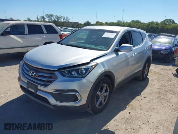 2018 Hyundai Santa Fe 2.4L with VIN 5XYZT3LB5JG563330, listed as a IAAI auction lot 43397944 with 124,663 mi miles and . Bid and sale history available at DreamBid. Image 2.