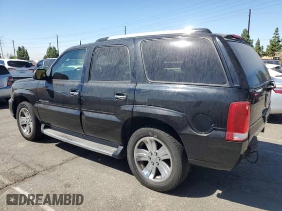 2004 Cadillac Escalade z VIN 1GYEK63N44R264635, wystawiony jako Copart lot #71562105 z przebiegiem 212 642 mil mil oraz Szkoda całkowita • Salvage title. Historia ofert i sprzedaży dostępna na DreamBid. Obrazek 2.