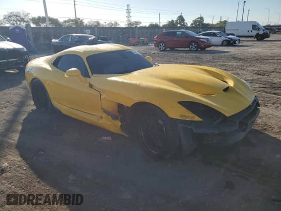 2014 Dodge Viper GTS with VIN 1C3ADEBZ2EV100035, listed as a Copart auction lot 42900805 with 23,409 mi miles and Salvage title. Bid and sale history available at DreamBid. Image 4.