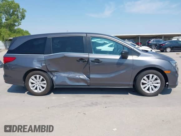 2019 Honda Odyssey LX z VIN 5FNRL6H27KB127002, wystawiony jako IAAI lot #43039064 z przebiegiem 133 950 mil mil oraz . Historia ofert i sprzedaży dostępna na DreamBid. Obrazek 13.