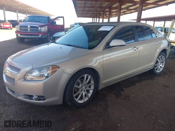 2012 Chevrolet Malibu LTZ 1LZ z VIN 1G1ZE5E06CF214418, wystawiony jako IAAI lot #43450311 z przebiegiem 177 772 mil mil oraz . Historia ofert i sprzedaży dostępna na DreamBid. Obrazek 17.