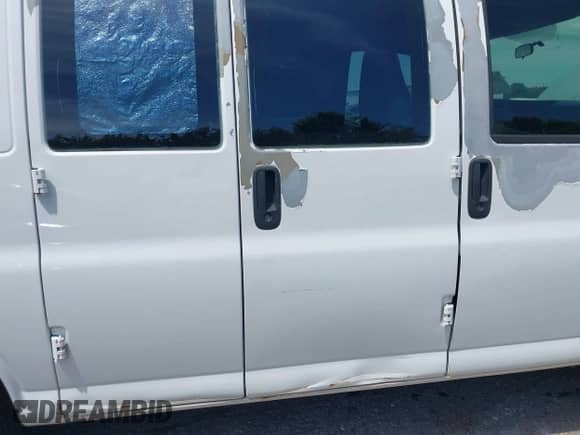 2009 Chevrolet Express Cargo with VIN 1GCGG25C991136904, listed as a IAAI auction lot 42616402 with 165,309 mi miles and . Bid and sale history available at DreamBid. Image 6.
