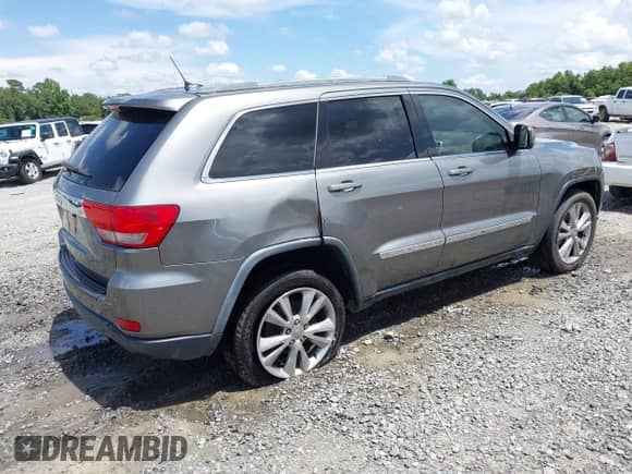 2012 Jeep Grand Cherokee Laredo с VIN 1C4RJEAT8CC361909, выставлен на аукционе IAAI как лот 42727510 с пробегом 191 020 миль миль и . История ставок и продаж доступна на DreamBid. Изображение 4.
