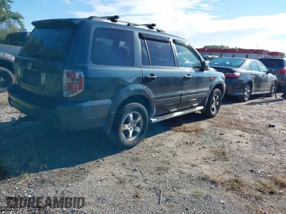 2006 Honda Pilot EX with VIN 5FNYF28426B020605, listed as a IAAI auction lot 43462429 with 198,855 mi miles and . Bid and sale history available at DreamBid. Image 4.