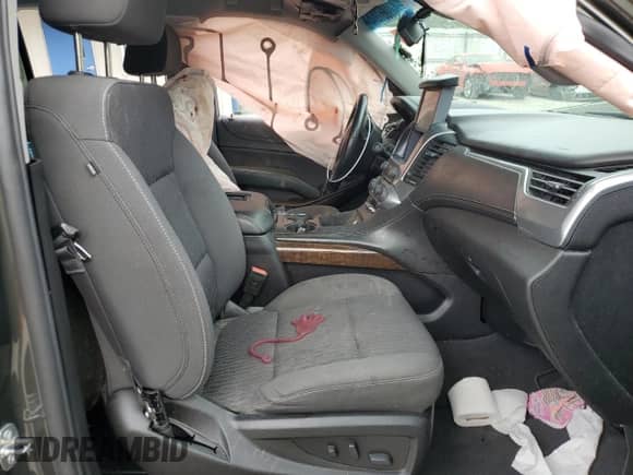2019 Chevrolet Tahoe LS z VIN 1GNSKAKC9KR212997, wystawiony jako Copart lot #65127514 z przebiegiem Nie podano mil oraz Szkoda całkowita • Salvage title. Historia ofert i sprzedaży dostępna na DreamBid. Obrazek 7.
