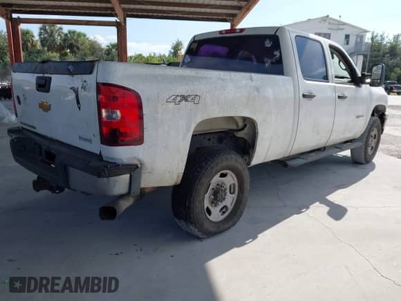 2013 Chevrolet Silverado 2500HD Work Truck with VIN 1GC1KVC8XDF124292, listed as a IAAI auction lot 43582977 with 445,918 mi miles and . Bid and sale history available at DreamBid. Image 4.