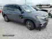 2016 Honda Pilot Touring с VIN 5FNYF6H9XGB088395, выставлен на аукционе Copart как лот 69828005 с пробегом Не указан миль и Списание • Salvage title. История ставок и продаж доступна на DreamBid. Изображение 4.