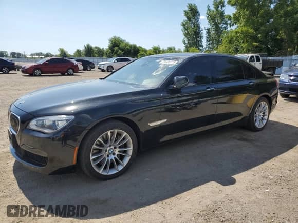 2013 BMW 7 Series 750Li xDrive with VIN WBAYF8C54DD139843, listed as a Copart auction lot 71526945 with 174,091 mi miles and Salvage title. Bid and sale history available at DreamBid. Image 1.