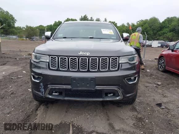 2017 Jeep Grand Cherokee Overland with VIN 1C4RJFCG0HC818791, listed as a IAAI auction lot 42574718 with 119,455 mi miles and . Bid and sale history available at DreamBid. Image 12.