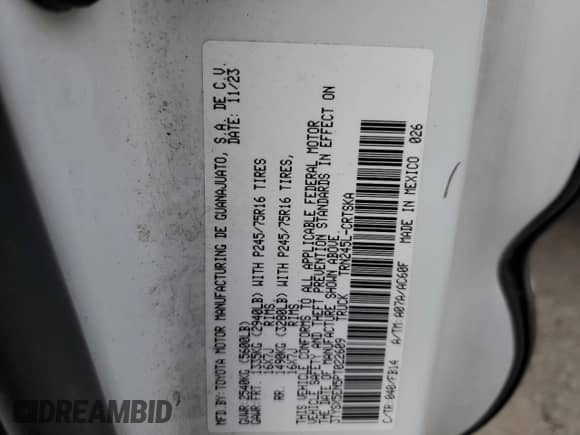 2023 Toyota Tacoma SR with VIN 3TYSX5EN5PT022609, listed as a Copart auction lot 81572905 with 7,923 mi miles and Salvage title. Bid and sale history available at DreamBid. Image 12.