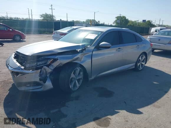 2018 Honda Accord Touring with VIN 1HGCV2F99JA049890, listed as a IAAI auction lot 42052972 with Not provided miles and . Bid and sale history available at DreamBid. Image 2.