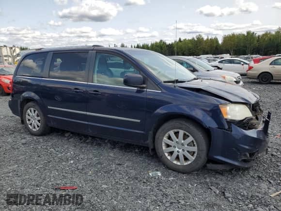 2012 Dodge Grand Caravan Crew with VIN 2C4RDGDG7CR285334, listed as a Copart auction lot 71012185 with Not provided miles and Salvage title. Bid and sale history available at DreamBid. Image 4.