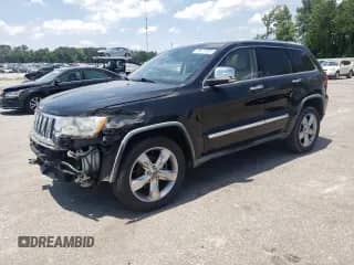 2012 Jeep Grand Cherokee Limited z VIN 1C4RJEBG7CC195450, wystawiony jako Copart lot #60673955 z przebiegiem 121 147 mil mil oraz Szkoda całkowita • Salvage title. Historia ofert i sprzedaży dostępna na DreamBid. Obrazek 1.