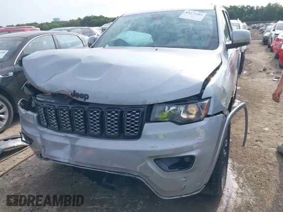 2020 Jeep Grand Cherokee Altitude with VIN 1C4RJFAG4LC116551, listed as a IAAI auction lot 43021481 with 129,650 mi miles and . Bid and sale history available at DreamBid. Image 6.