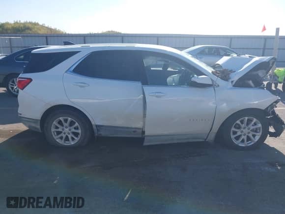 2018 Chevrolet Equinox LT with VIN 2GNAXSEV8J6194163, listed as a IAAI auction lot 43099831 with 97,376 mi miles and . Bid and sale history available at DreamBid. Image 12.