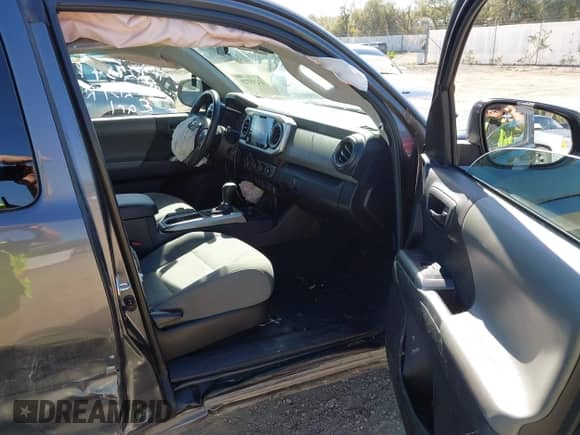 2022 Toyota Tacoma SR with VIN 3TYSX5EN3NT012139, listed as a IAAI auction lot 43293729 with 40,401 mi miles and . Bid and sale history available at DreamBid. Image 5.