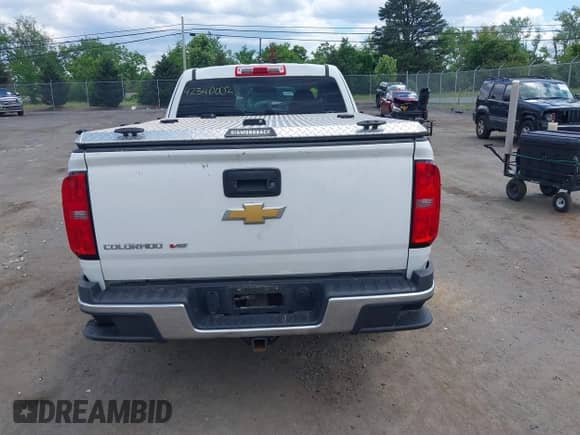 2018 Chevrolet Colorado 2WD Work Truck z VIN 1GCHSBEN4J1155188, wystawiony jako IAAI lot #42340002 z przebiegiem 83 422 mil mil oraz . Historia ofert i sprzedaży dostępna na DreamBid. Obrazek 15.