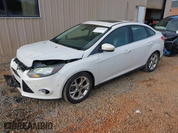 2012 Ford Focus Titanium with VIN 1FAHP3J2XCL346937, listed as a IAAI auction lot 42857040 with 170,544 mi miles and . Bid and sale history available at DreamBid. Image 2.