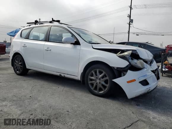 2012 Hyundai Elantra SE z VIN KMHDC8AE7CU142761, wystawiony jako Copart lot #85588045 z przebiegiem 126 401 mil mil oraz Szkoda całkowita • Salvage title. Historia ofert i sprzedaży dostępna na DreamBid. Obrazek 4.