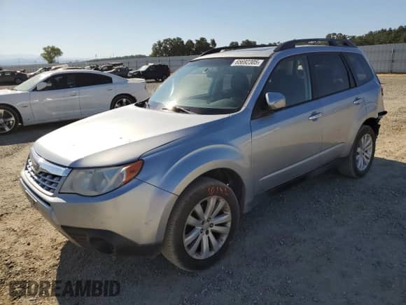 2013 Subaru Forester X Premium z VIN JF2SHADC7DH435733, wystawiony jako Copart lot #65692305 z przebiegiem 189 914 mil mil oraz Szkoda całkowita • Salvage title. Historia ofert i sprzedaży dostępna na DreamBid. Obrazek 1.