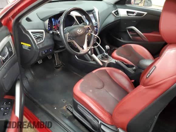 2012 Hyundai Veloster w/Black Int z VIN KMHTC6AD3CU049324, wystawiony jako Copart lot #85596195 z przebiegiem 171 178 mil mil oraz Szkoda całkowita • Salvage title. Historia ofert i sprzedaży dostępna na DreamBid. Obrazek 8.