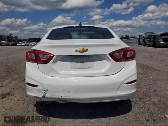 2019 Chevrolet Cruze LS с VIN 1G1BC5SM6K7102595, выставлен на аукционе Copart как лот 70303805 с пробегом 73 877 миль миль и Списание • Salvage title. История ставок и продаж доступна на DreamBid. Изображение 6.