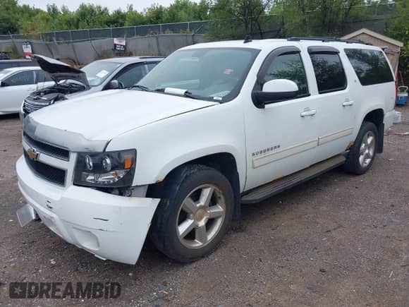 2010 Chevrolet Suburban LT with VIN 1GNUKJE32AR113764, listed as a IAAI auction lot 43277102 with 297,432 mi miles and . Bid and sale history available at DreamBid. Image 2.