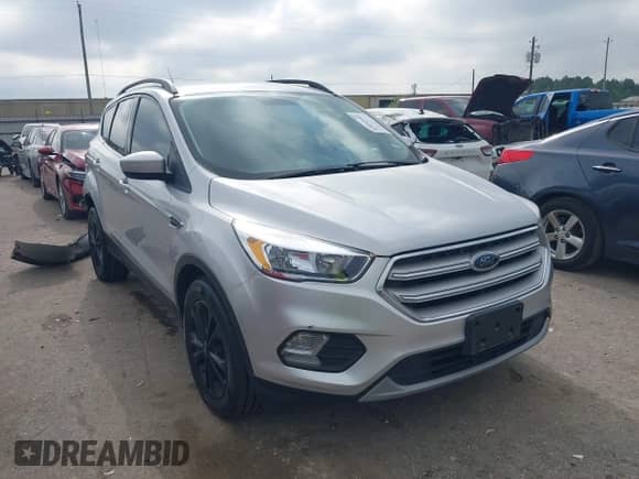 2018 Ford Escape SE z VIN 1FMCU9GD9JUC78285, wystawiony jako IAAI lot #43092402 z przebiegiem 111 326 mil mil oraz . Historia ofert i sprzedaży dostępna na DreamBid. Obrazek 1.