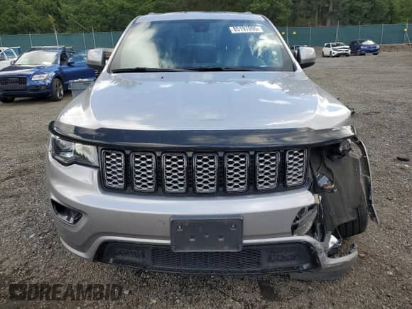 2017 Jeep Grand Cherokee Altitude with VIN 1C4RJFAG7HC720165, listed as a Copart auction lot 85197095 with 83,075 mi miles and Salvage title. Bid and sale history available at DreamBid. Image 5.