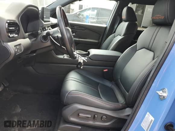 2025 Honda Pilot TrailSport with VIN 5FNYG1H60SB028186, listed as a Copart auction lot 67749635 with 11,752 mi miles and Salvage title. Bid and sale history available at DreamBid. Image 7.