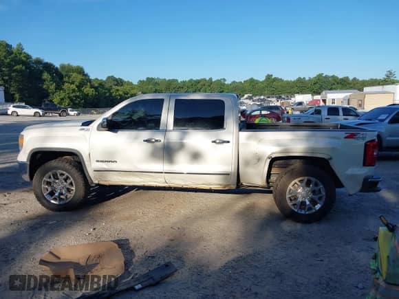 2014 GMC Sierra 1500 SLT z VIN 3GTU2VEC7EG336016, wystawiony jako IAAI lot #42830434 z przebiegiem 143 267 mil mil oraz . Historia ofert i sprzedaży dostępna na DreamBid. Obrazek 14.