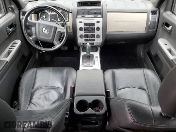 2008 Mercury Mariner Premier with VIN 4M2CU97188KJ32728, listed as a Copart auction lot 70736905 with 217,659 mi miles and Salvage title. Bid and sale history available at DreamBid. Image 8.