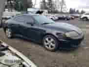 2006 Hyundai Tiburon GS with VIN KMHHM65DX6U225464, listed as a Copart auction lot 83561984 with 182,245 mi miles and Salvage title. Bid and sale history available at DreamBid. Image 4.