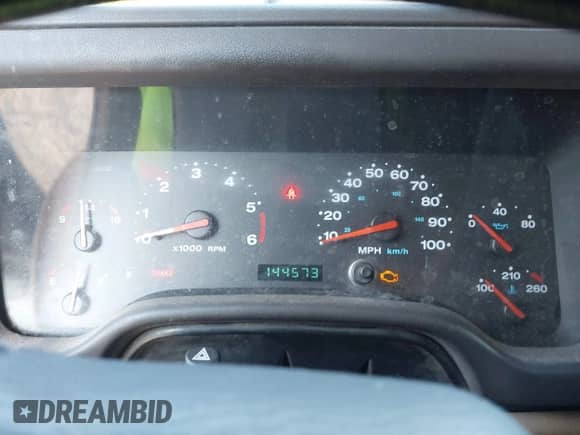 2002 Jeep Wrangler Sahara z VIN 1J4FA59S02P703627, wystawiony jako IAAI lot #42815504 z przebiegiem 144 573 mil mil oraz . Historia ofert i sprzedaży dostępna na DreamBid. Obrazek 7.