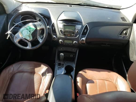 2011 Hyundai Tucson Limited with VIN KM8JU3AC7BU222304, listed as a Copart auction lot 71310104 with 118,726 mi miles and Salvage title. Bid and sale history available at DreamBid. Image 8.