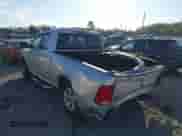 2018 Ram 1500 SLT with VIN 1C6RR6GG2JS119281, listed as a IAAI auction lot 41897492 with 242,877 mi miles and . Bid and sale history available at DreamBid. Image 3.