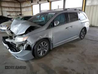 2014 Honda Odyssey Touring с VIN 5FNRL5H96EB030921, выставлен на аукционе Copart как лот 70405015 с пробегом Не указан миль и Списание • Salvage title. История ставок и продаж доступна на DreamBid. Изображение 1.