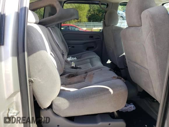 2004 Chevrolet Suburban LT z VIN 3GNEC16ZX4G286084, wystawiony jako Copart lot #72546834 z przebiegiem 250 830 mil mil oraz Szkoda całkowita • Salvage title. Historia ofert i sprzedaży dostępna na DreamBid. Obrazek 11.