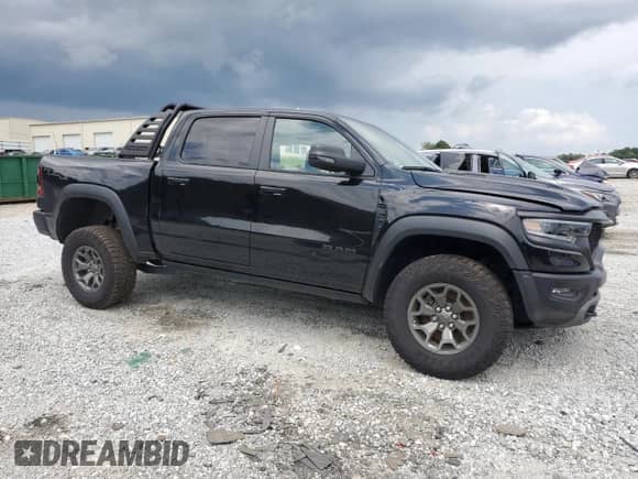 2024 Ram 1500 TRX с VIN 1C6SRFU98RN169734, выставлен на аукционе Copart как лот 65521675 с пробегом 17 577 миль миль и Списание • Salvage title. История ставок и продаж доступна на DreamBid. Изображение 4.