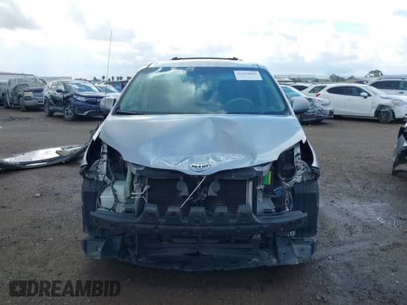 2011 Toyota Sienna SE with VIN 5TDXK3DC4BS158484, listed as a IAAI auction lot 41423843 with 162,939 mi miles and . Bid and sale history available at DreamBid. Image 13.